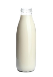 Photo of Bottle of milk on white background