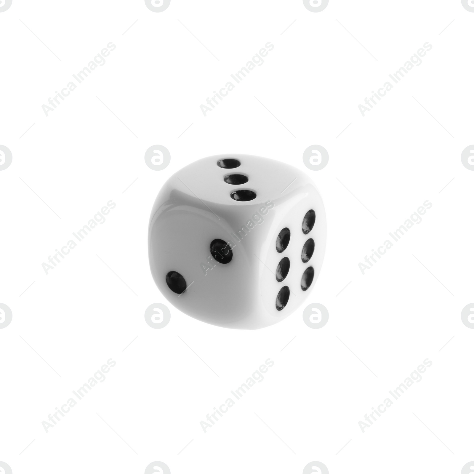 Photo of One plastic game dice isolated on white