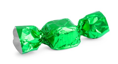 Tasty candy in green wrapper isolated on white