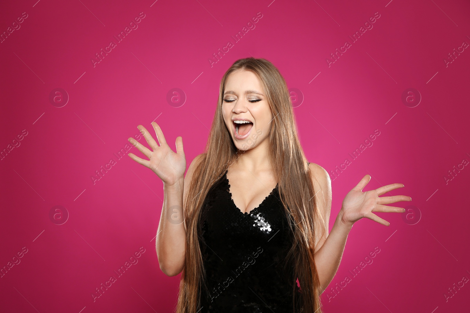Photo of Portrait of emotional woman on colorful background