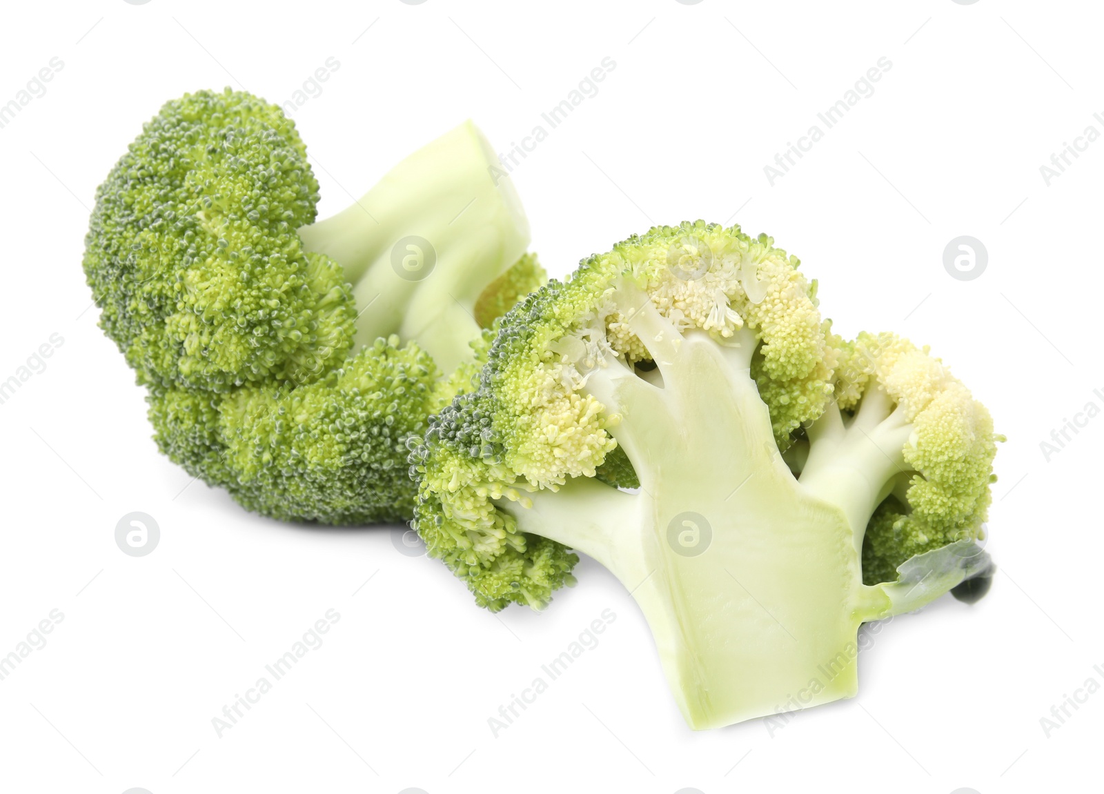 Photo of Cut raw green broccoli isolated on white