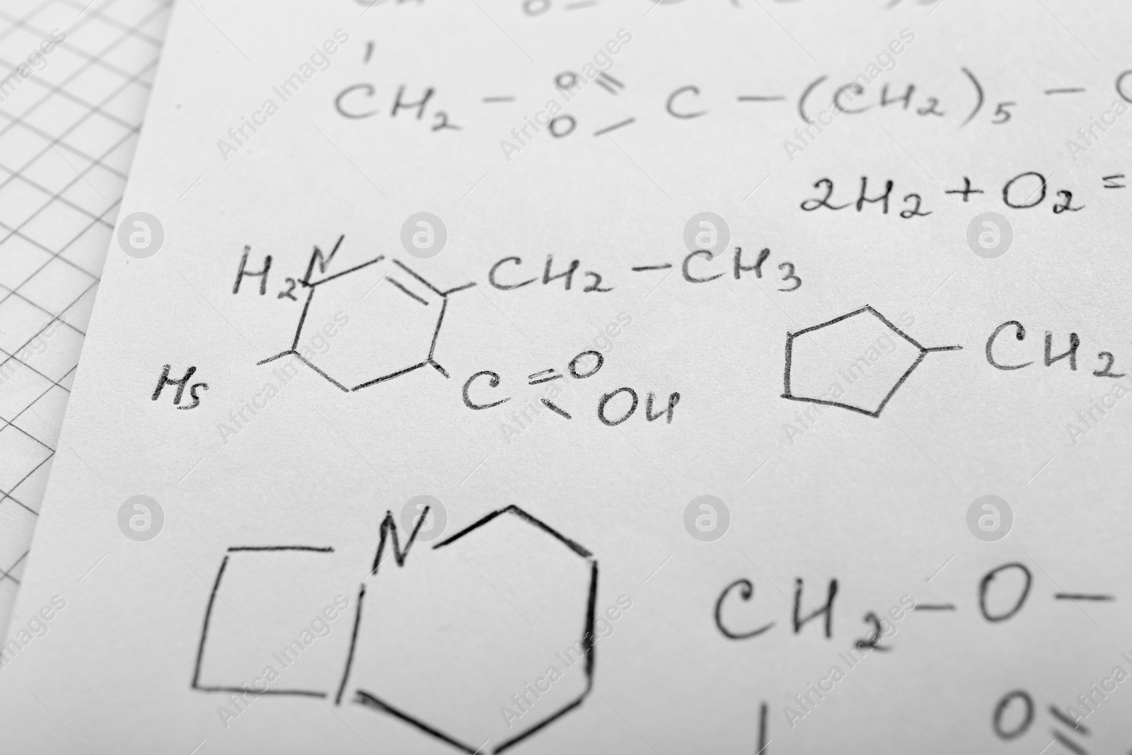 Photo of Sheet of paper with different chemical formulas, closeup