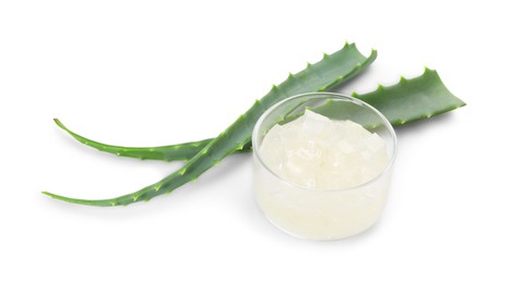 Aloe vera gel and slices of plant isolated on white
