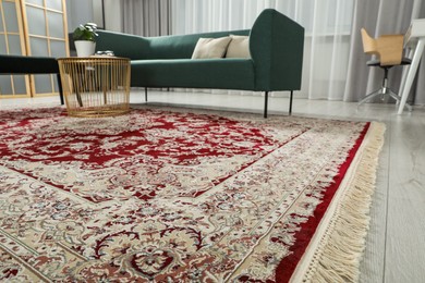 Photo of Stylish living room with beautiful carpet and furniture, closeup. Interior design