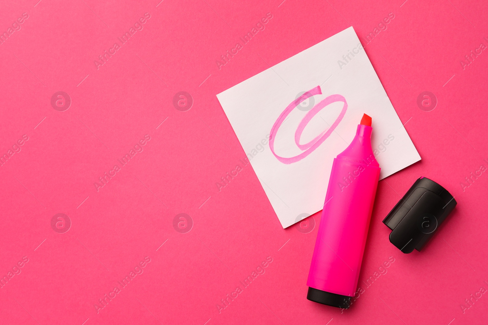 Photo of Bright color marker and sticky note on pink background, flat lay. Space for text