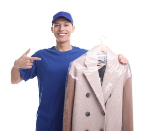 Dry-cleaning delivery. Happy courier holding coat in plastic bag on white background