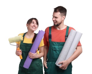 Photo of Workers with wallpaper rolls and roller on white background