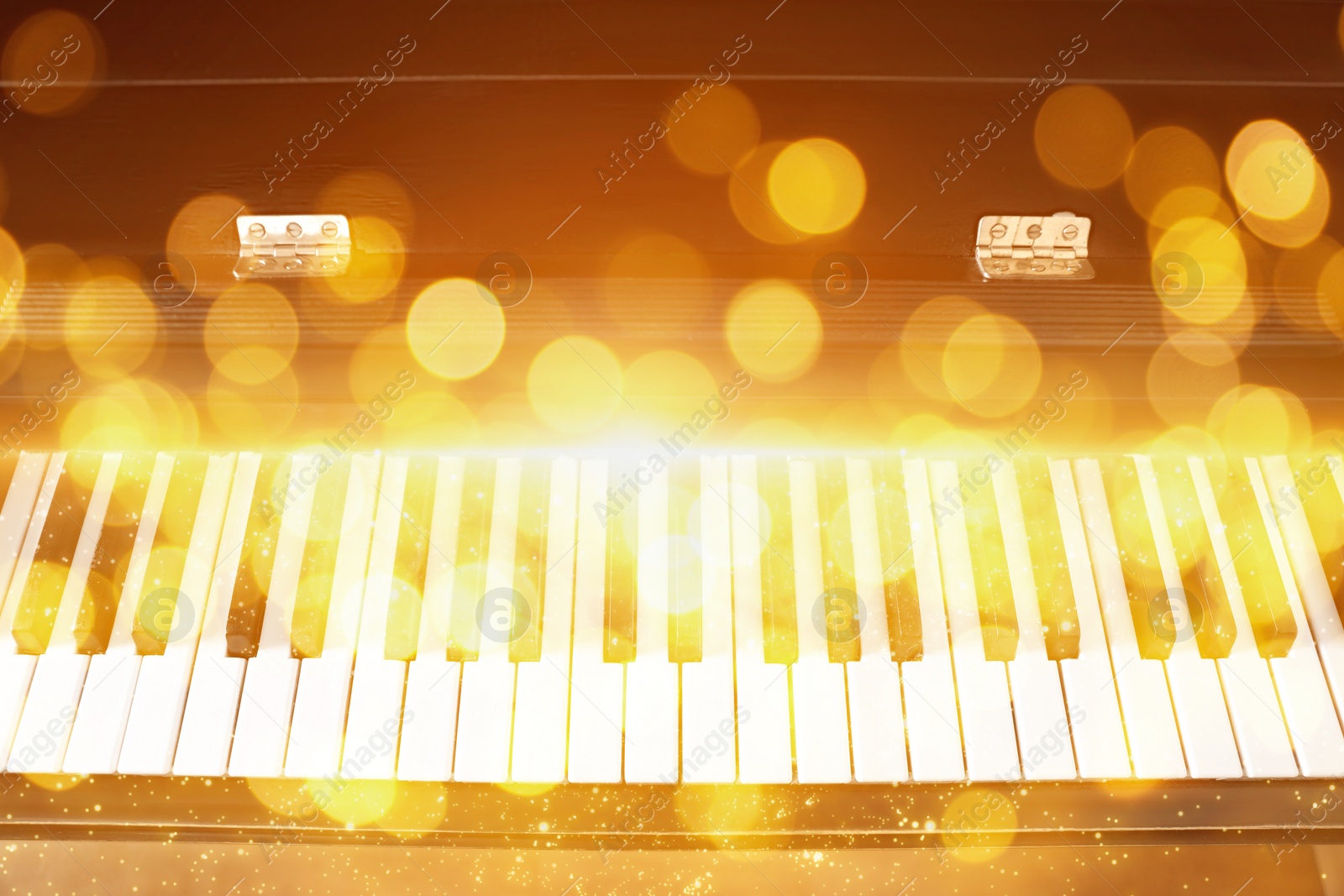 Image of Christmas and New Year music. Piano, closeup. Bokeh effect