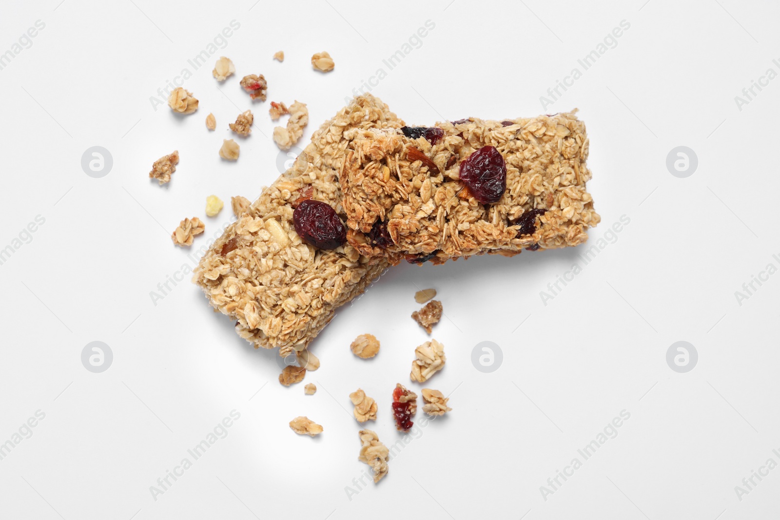 Photo of Tasty granola bars on white background, top view