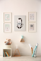 Photo of Beautiful pictures in stylish child's room interior