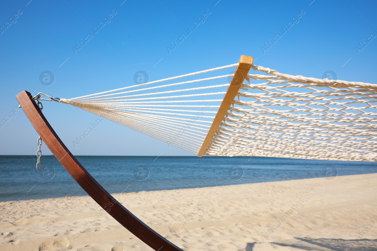 Photo of Empty hammock at seaside. Time to relax