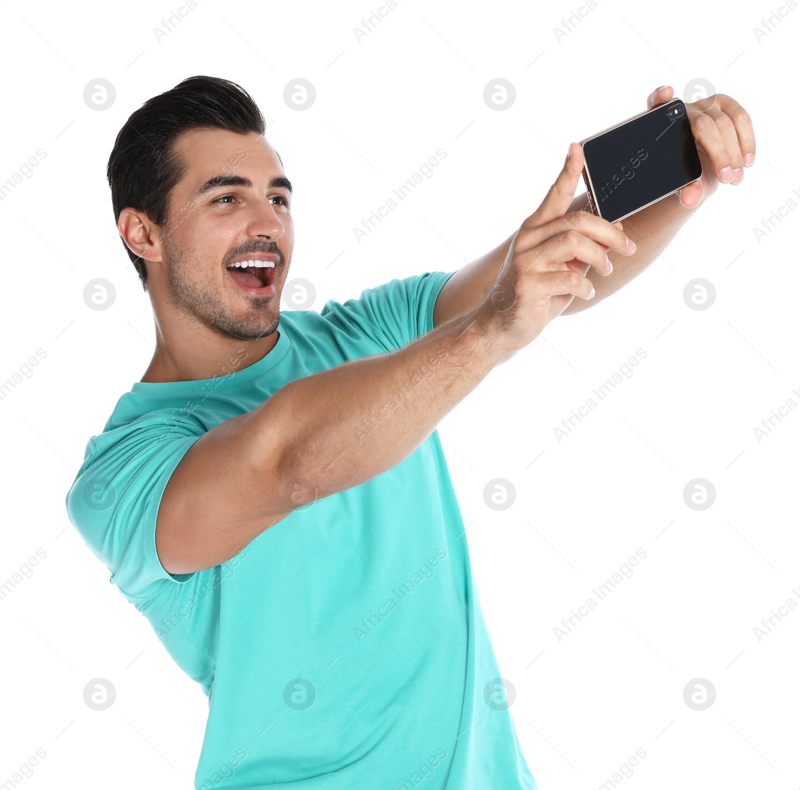 Photo of Happy young man taking selfie on white background