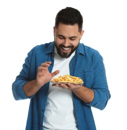 Photo of Young man with French fries on white background