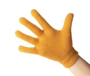 Woman in yellow woolen glove on white background, closeup. Winter clothes