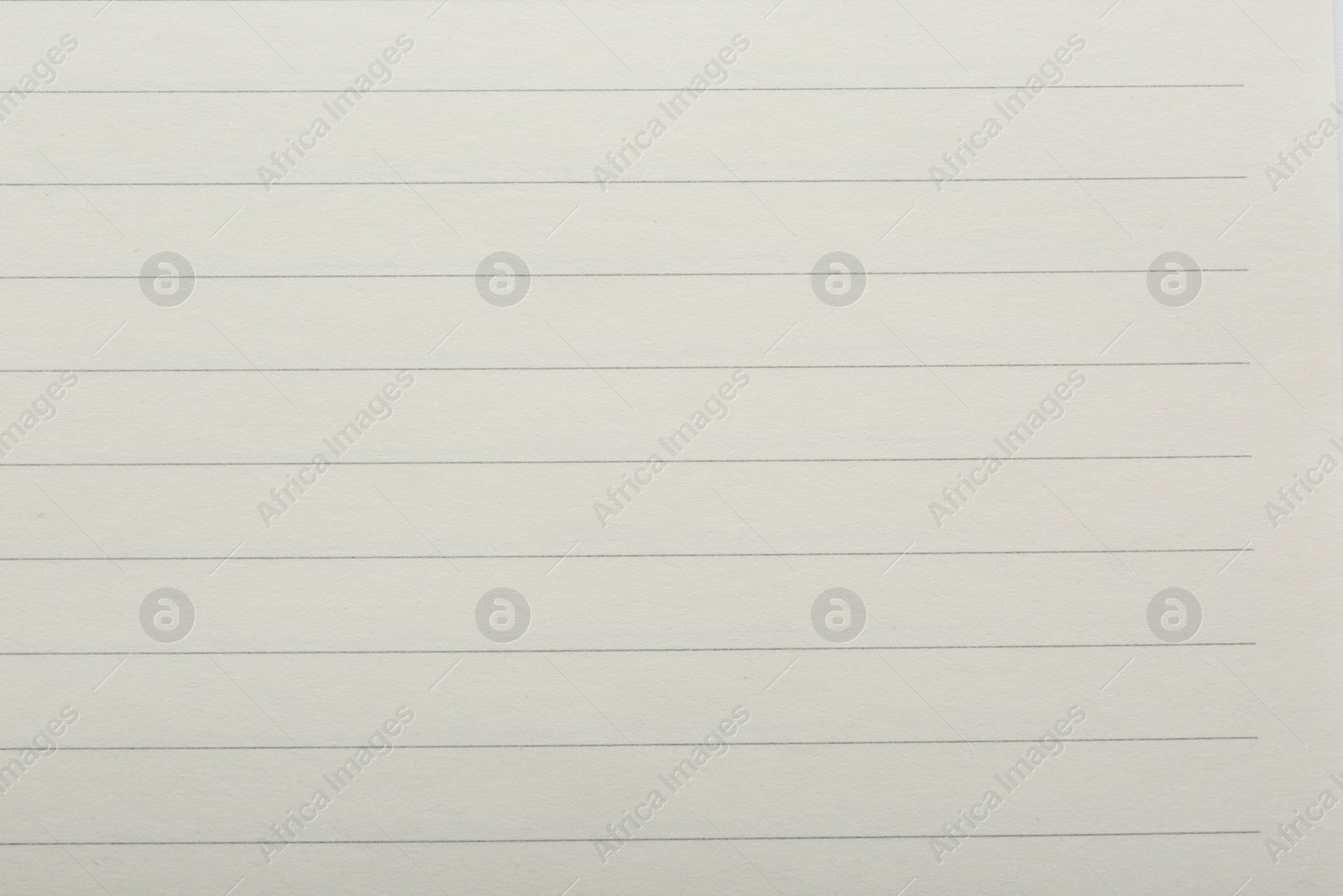 Photo of Lined notebook sheet as background, top view