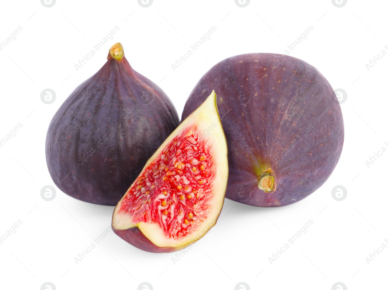 Photo of Whole and cut ripe figs isolated on white