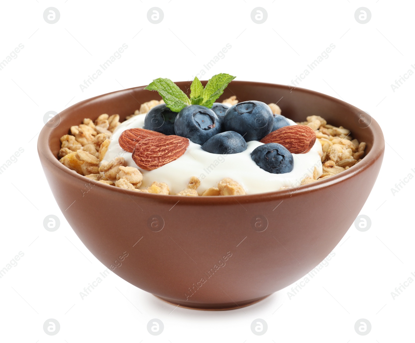 Photo of Bowl of tasty oatmeal with blueberries, yogurt and almond on white background