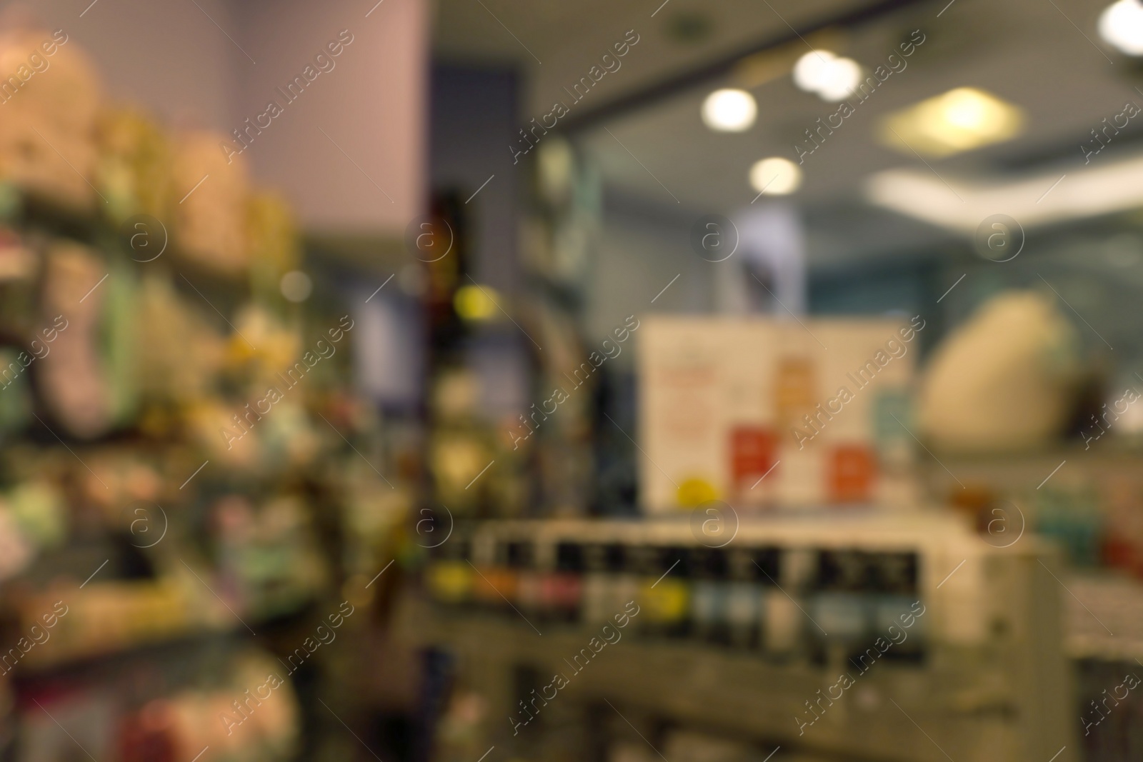 Photo of Blurred view of store interior in shopping mall. Bokeh effect