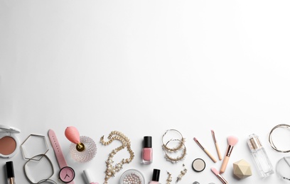 Photo of Composition with perfume bottles, cosmetics and accessories on white background, top view