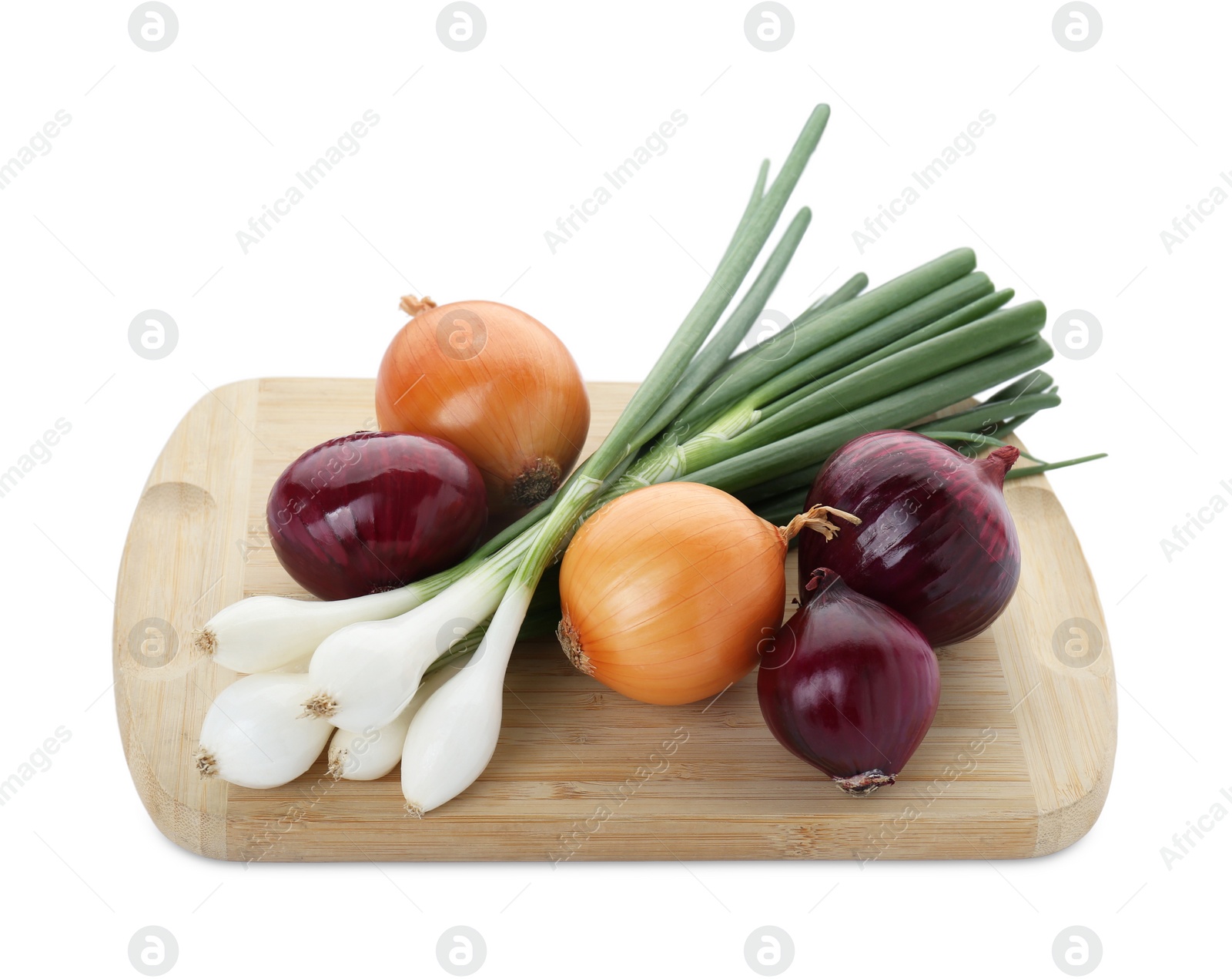 Photo of Wooden board with different kinds of onions isolated on white