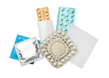 Photo of Contraceptive pills, condoms and patch isolated on white, top view. Different birth control methods