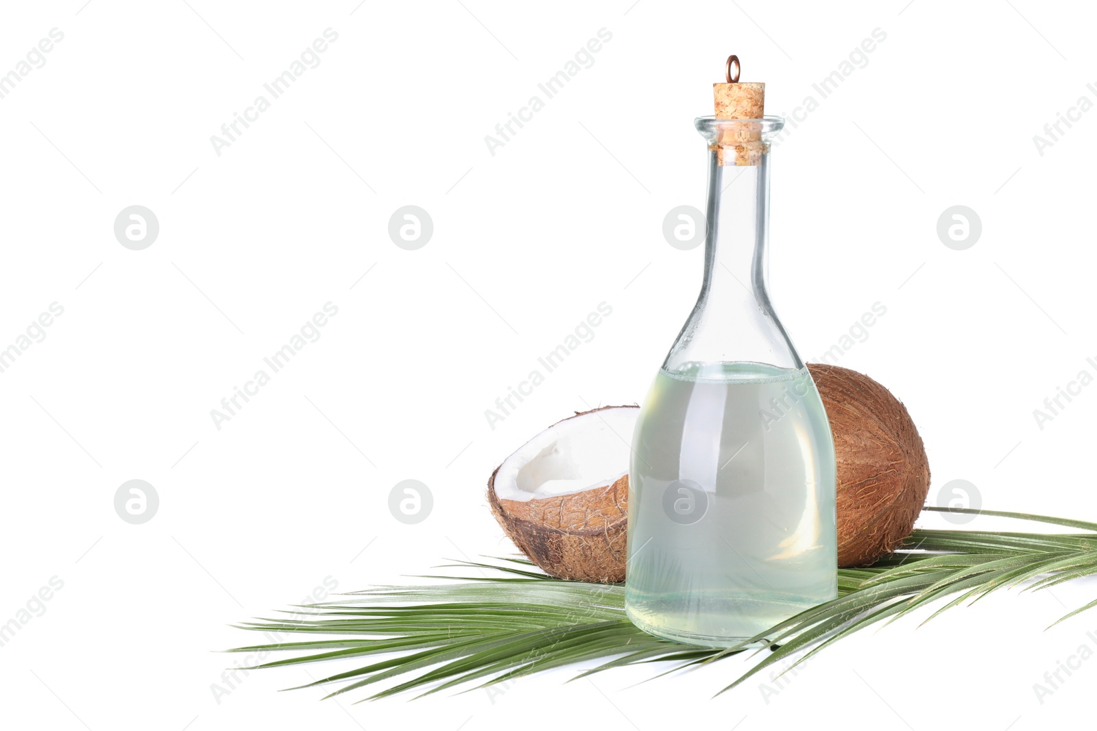 Photo of Composition with coconut oil on white background