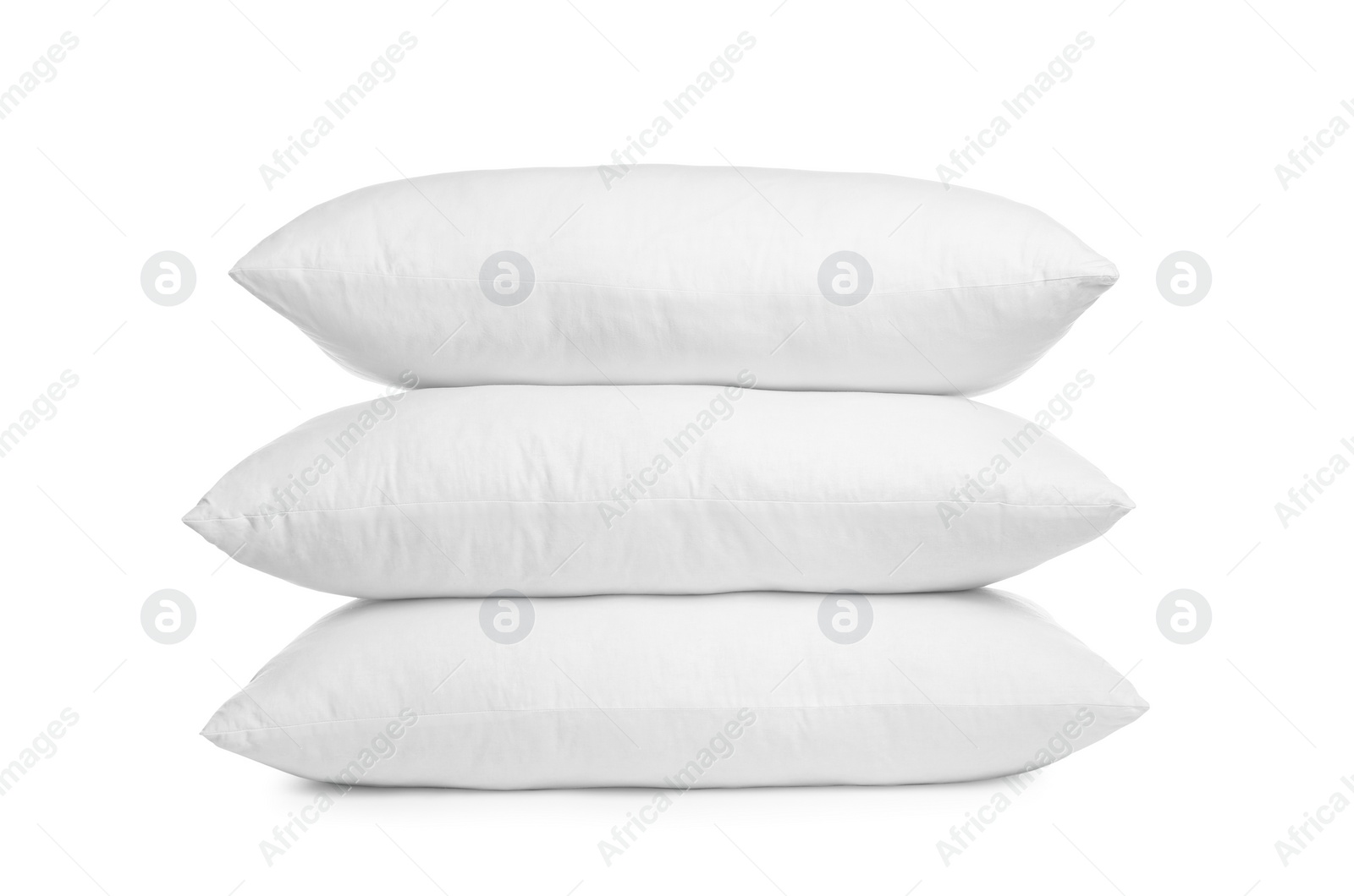 Photo of Stack of soft pillows isolated on white