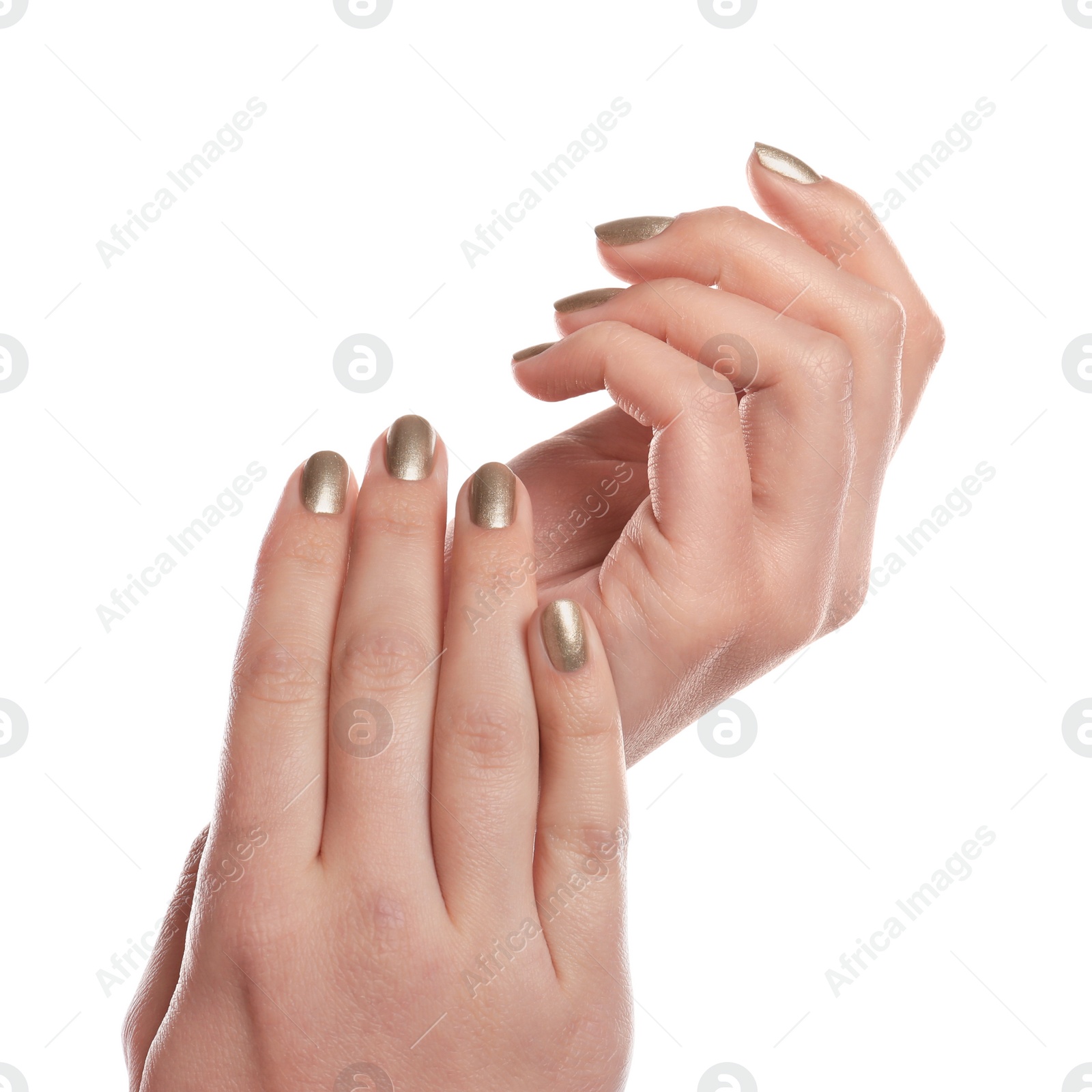 Photo of Woman showing gold manicure isolated on white, closeup. Nail polish trends