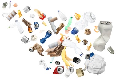 Image of Lots of different garbage flying on white background