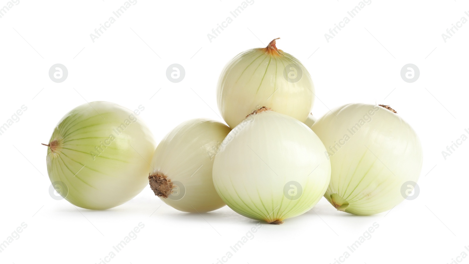 Photo of Fresh peeled onion bulbs on white background