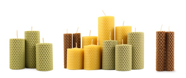 Image of Set of beeswax candles on white background