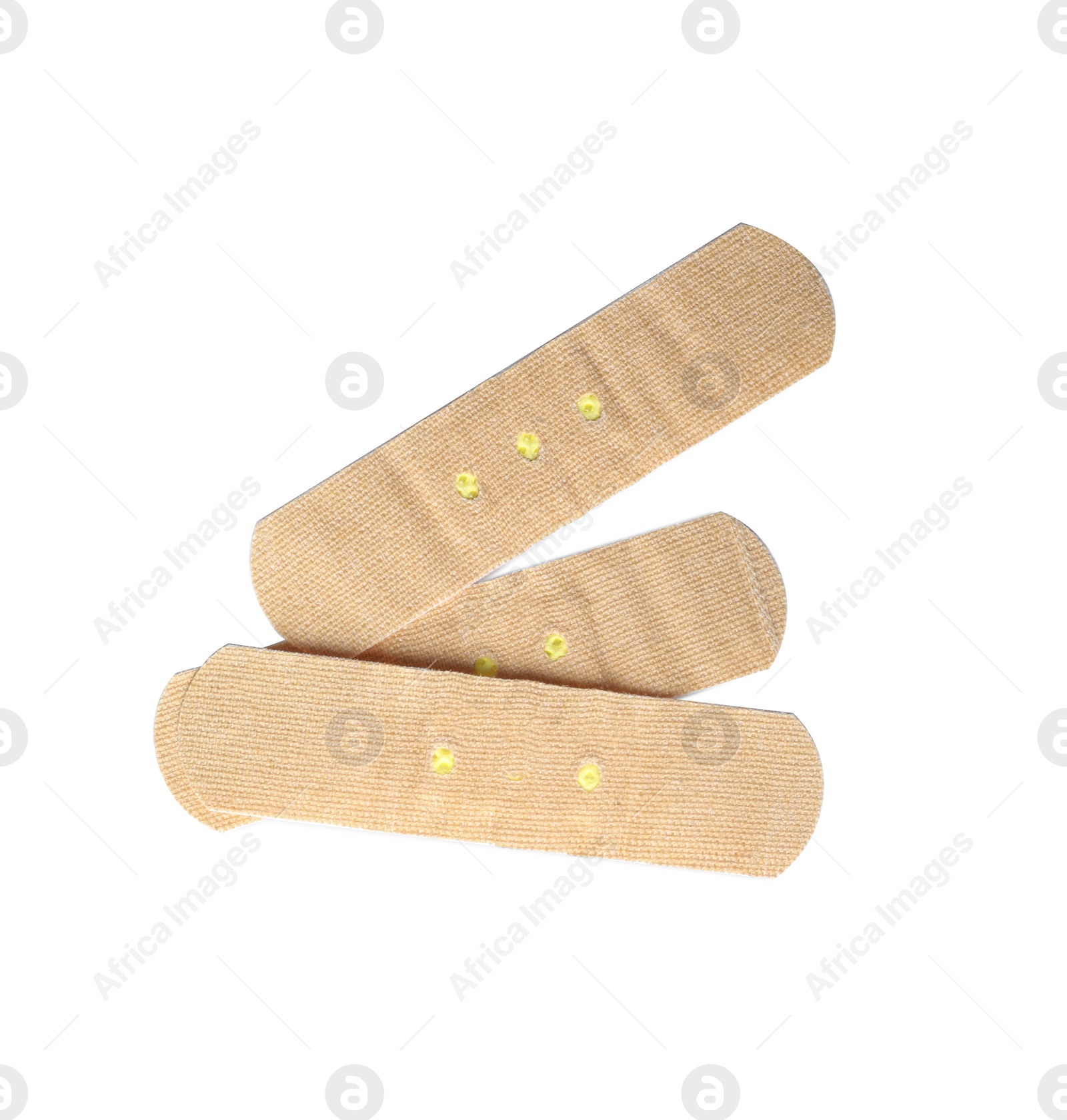 Medical sticking plasters isolated on white. First aid item Photo of Medical sticking plasters isolated on white. First aid item