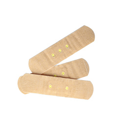 Photo of Medical sticking plasters isolated on white. First aid item