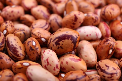 Photo of Dry kidney beans as background, closeup view