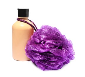 Photo of New purple shower puff and bottle of cosmetic product on white background