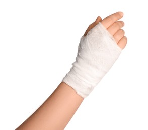 Photo of Woman with hand wrapped in medical bandage on white background, closeup