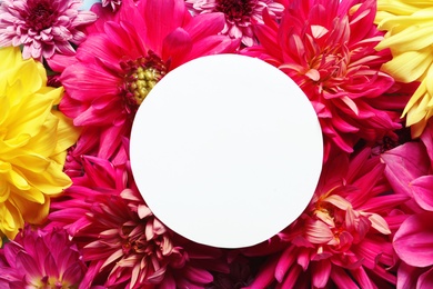 Photo of Composition with beautiful dahlia flowers and blank card, top view