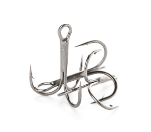 Photo of Metal hooks on white background. Fishing accessories