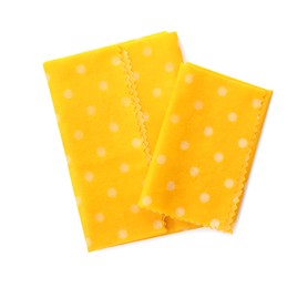 Photo of Reusable beeswax food wraps on white background, top view