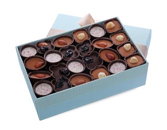 Photo of Box of delicious chocolate candies isolated on white
