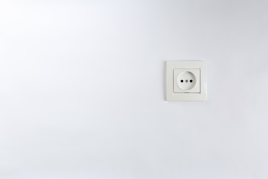 Power socket on white background. Electrician's equipment