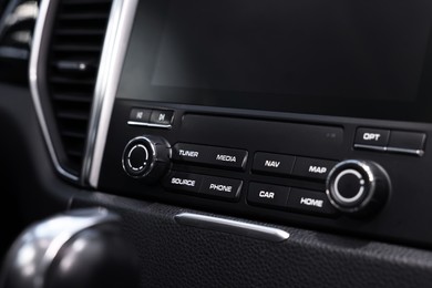 Photo of Dashboard inside of modern black car, closeup