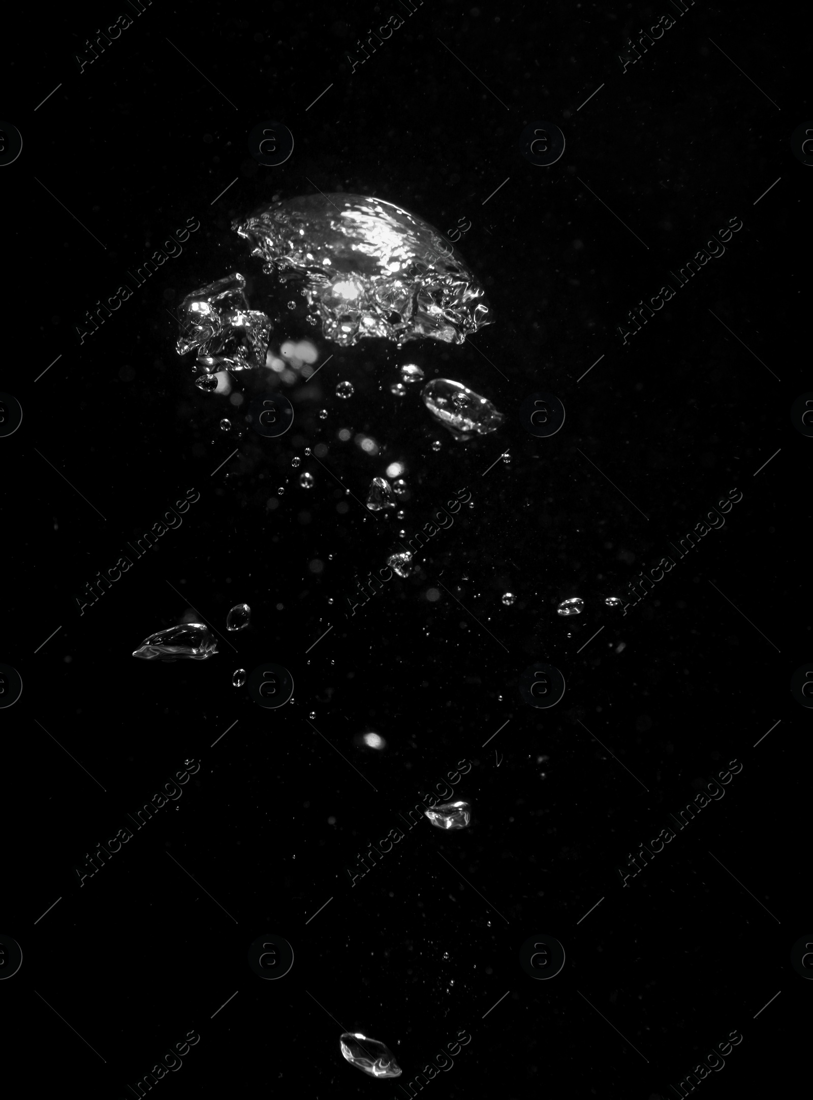 Photo of Air bubbles in water on black background