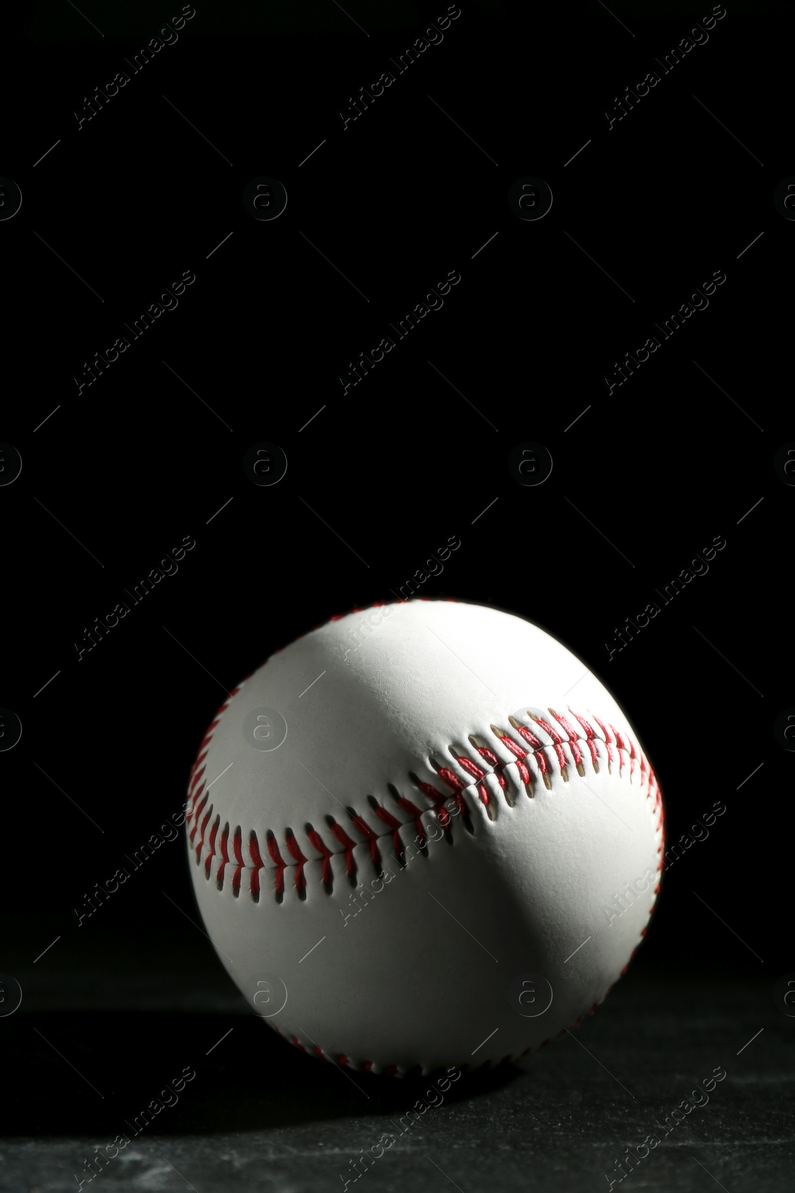 Photo of Baseball ball on black background. Sports game