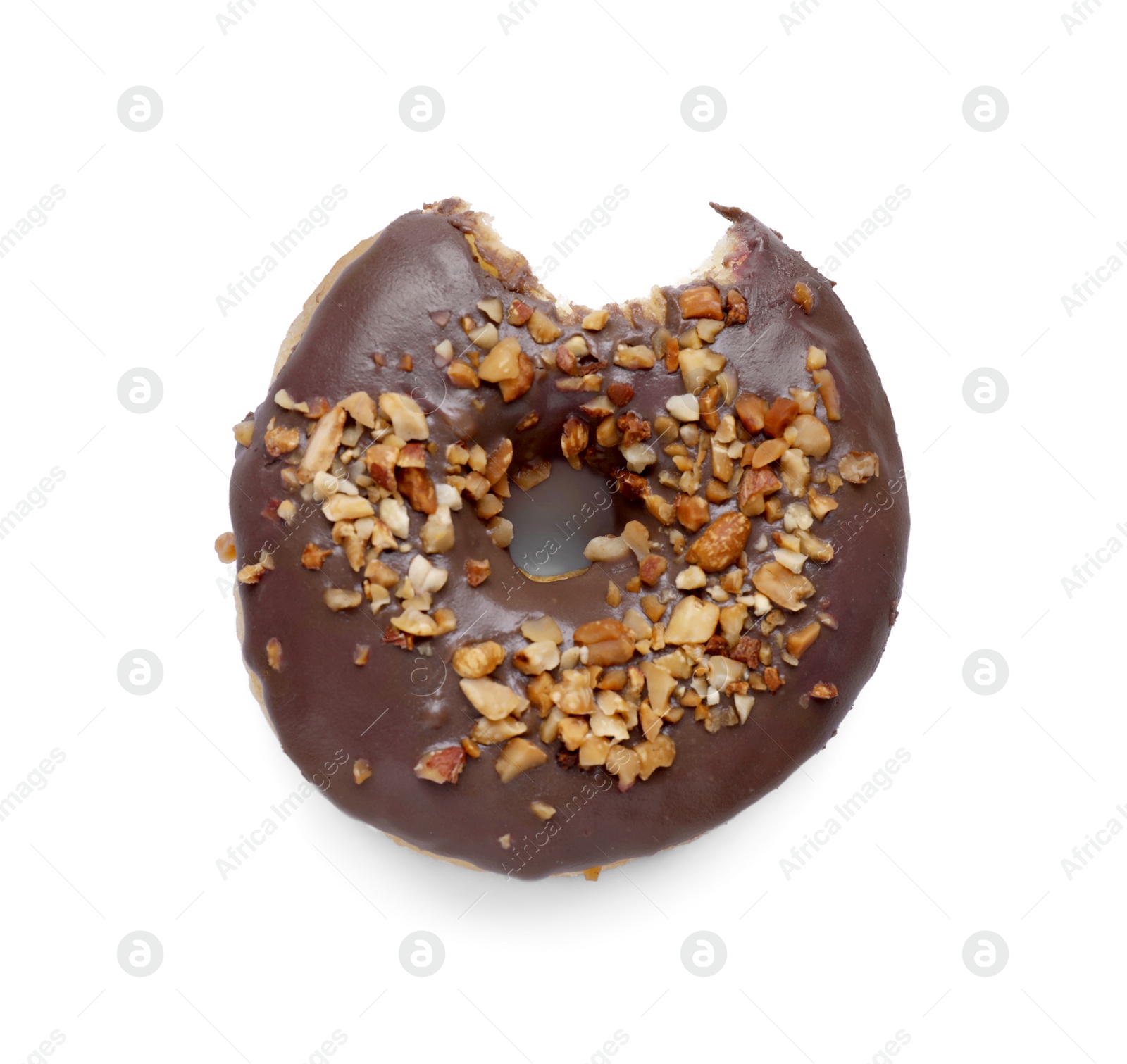 Photo of Tasty bitten glazed donut decorated with nuts isolated on white, top view