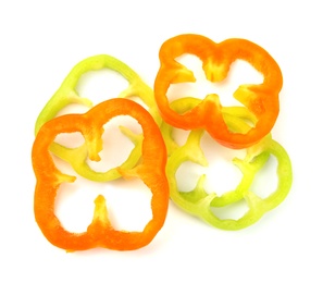 Photo of Rings of ripe bell peppers on white background, top view