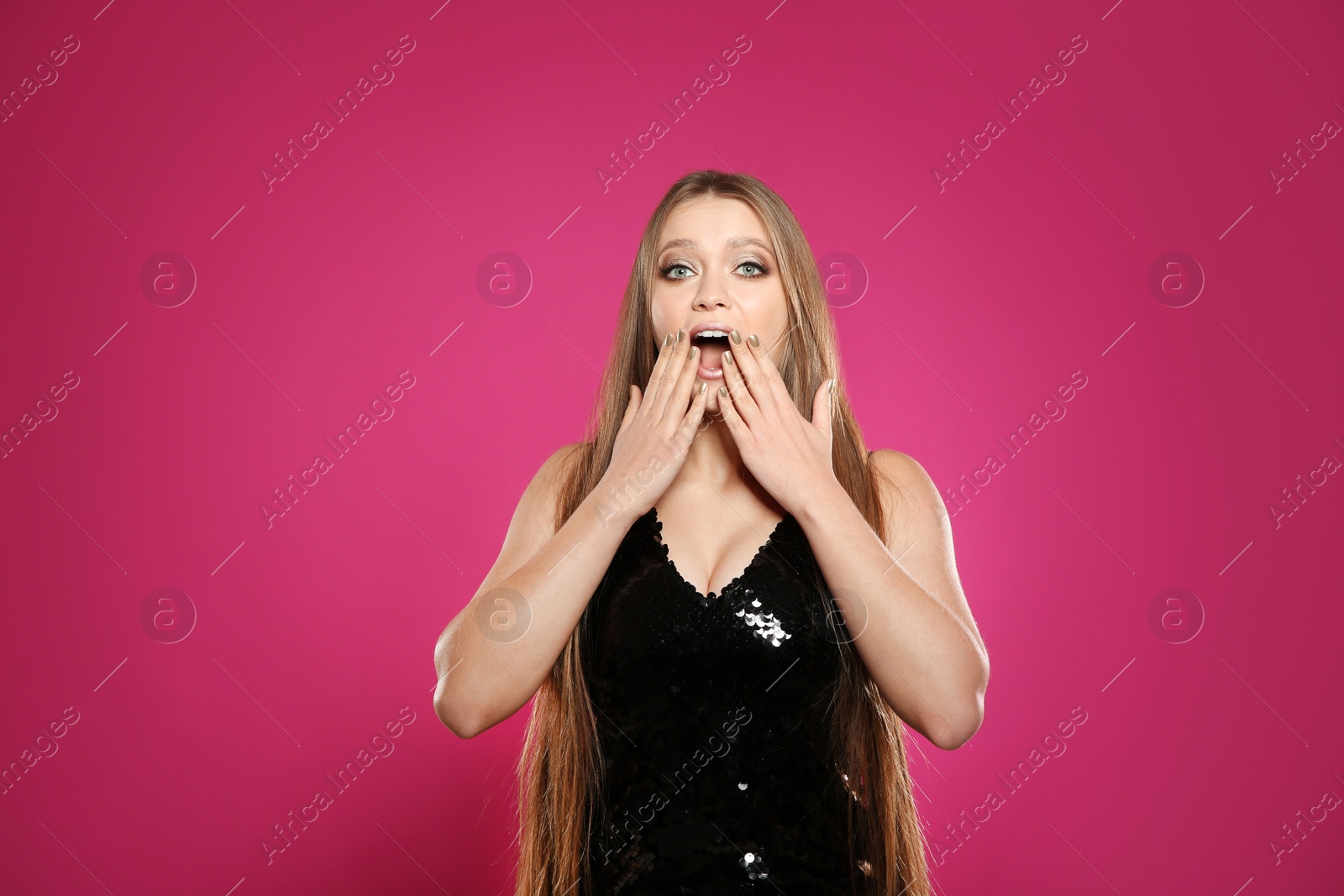 Photo of Portrait of emotional woman on colorful background