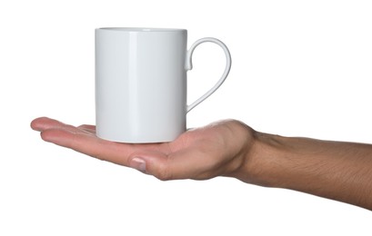 Man holding mug on white background, closeup