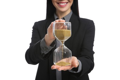 Photo of Businesswoman holding hourglass on white background, closeup. Time management