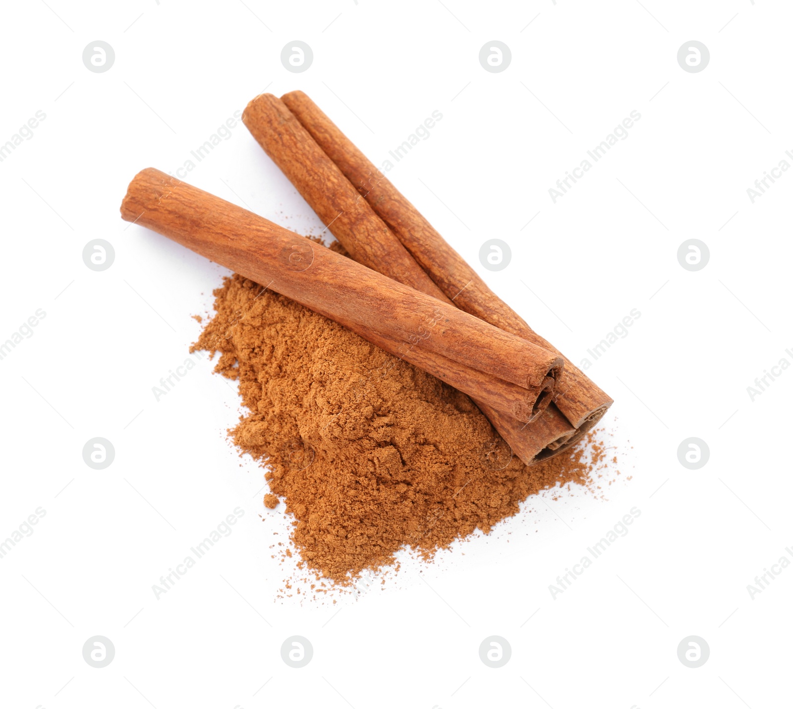 Photo of Aromatic cinnamon sticks and powder on white background